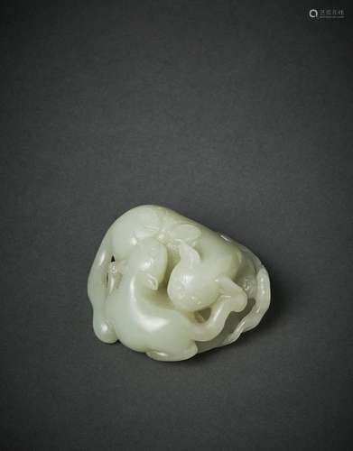 A CELADON - WHITE JADE CARVED PAPER WEIGHT OF TWO BADGERS, Q...