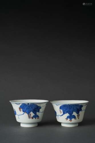 A PAIR OF BLUE AND WHITE AND COPPER RED CUPS, GUANGXU SIX-CH...