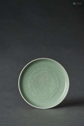 A SMALL CELADON DISH, QING YI TANG ZHI FOUR CHARACTER HALL M...