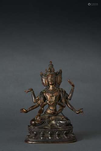 A SINO-TIBETAN GILT BRONZE SEATED FIGURE OF USNISAVIJAYA, 18...