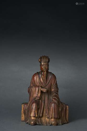 A GILT LACQUERED BRONZE MODEL OF A DAOIST FIGURE, MING DYNAS...