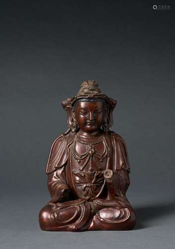 A RARE GOLD AND RED LACQUER ON WOOD SCULPTURE OF BUDDHA, YUA...