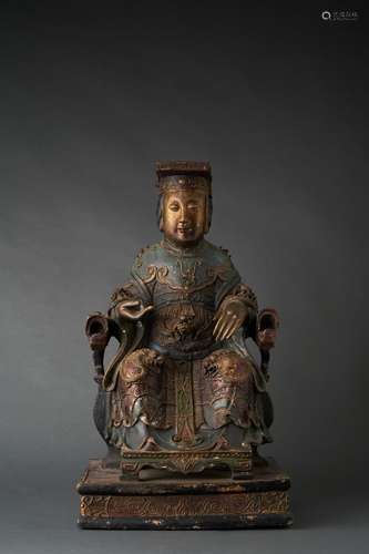 A POLYCHROME AND PARCEL GILT WOOD FIGURE OF MAZU, QING DYNAS...