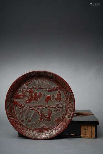 A LARGE CARVED RED LACQUER DISH, QING DYNASTY, 18TH CENTURY