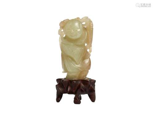A CELADON JADE CARVING OF A BOY, QING DYNASTY (1644-1912)