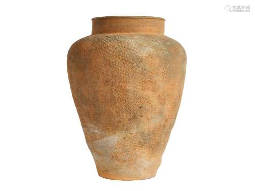 AN IMPRESSED TEXTILE-DECORATED POTTERY JAR, WARRING STATE PE...
