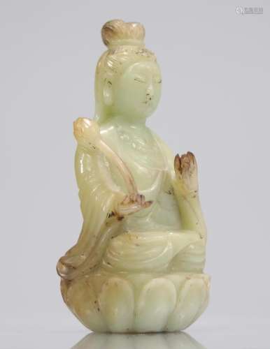 Guanyin in celadon green jade seated on a Qing period lotus ...