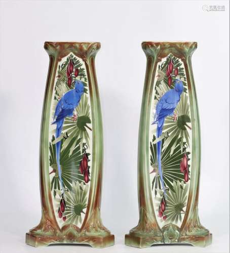 Pair of art-deco columns decorated with blue macaws, K G Lun...