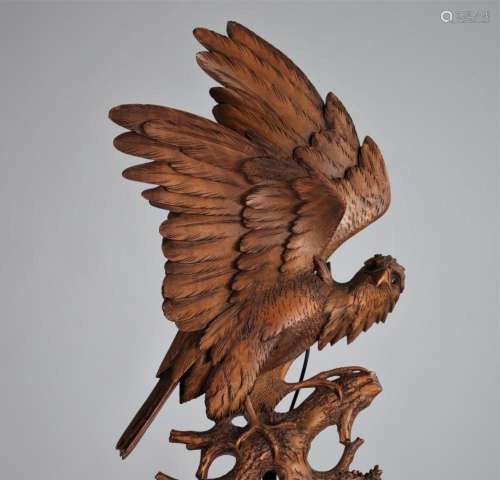 Black Forest thermometer barometer surmounted by an eagle