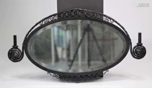 Art-deco mirror in wrought iron and bevelled glass, in the s...