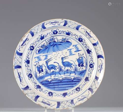 Large 18th century Delft dish decorated with characters and ...