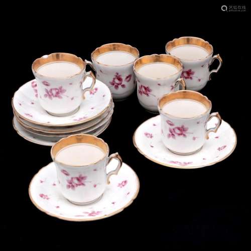SIX CUPS AND SAUCERS