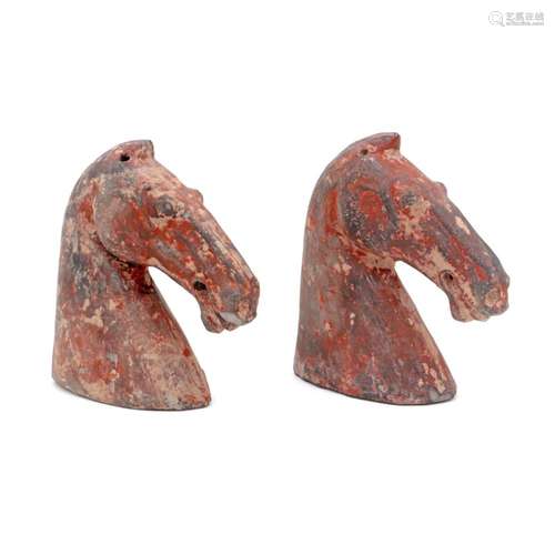 A PAIR OF HAN HORSE HEADS