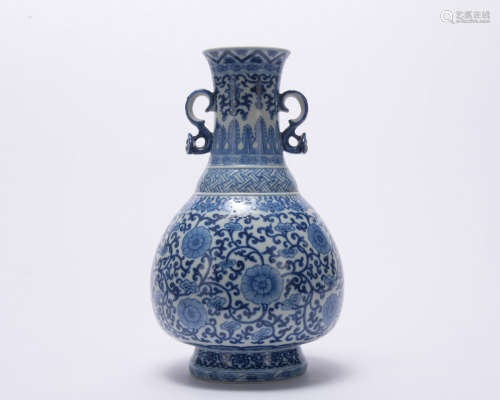 A blue and white 'floral' vase with two ears