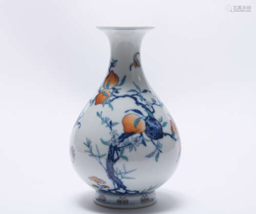 A blue and white 'peach blossom' pear-shaped vase