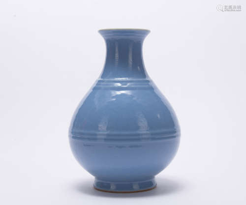 A sky blue glazed pear-shaped vase