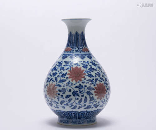 An underglaze-blue and copper-red 'floral' pear-shaped vase