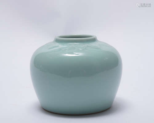 A celadon-glazed jar