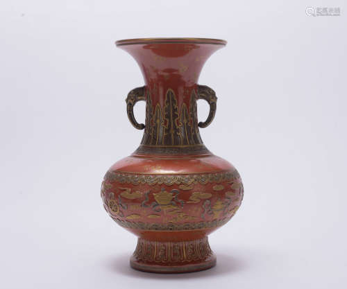 A bronze glazed vase with two ears