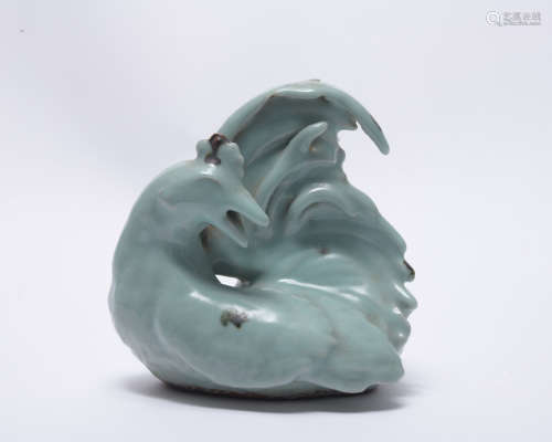 A bean-green glazed ceramic crafts like bird