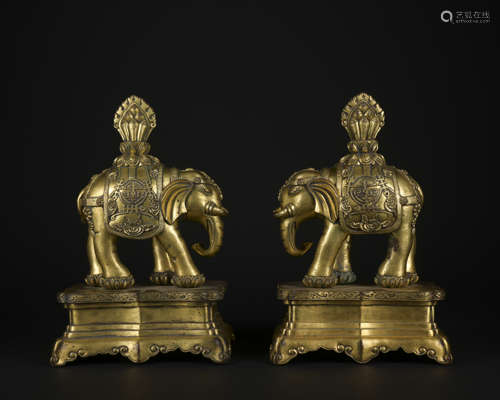 A pair of gilt-bronze elephant