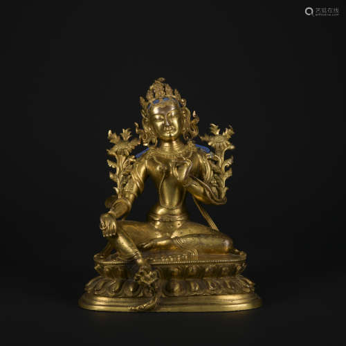 A gilt-bronze statue of Tara