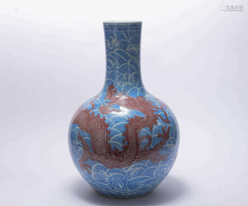 An underglaze-blue and copper-red 'dragon' globular vase