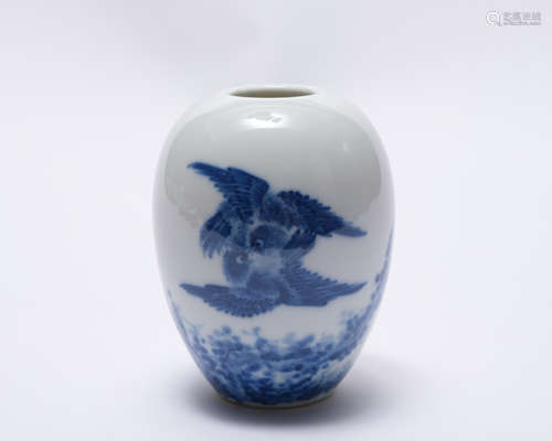 A blue and white 'floral and birds' jar