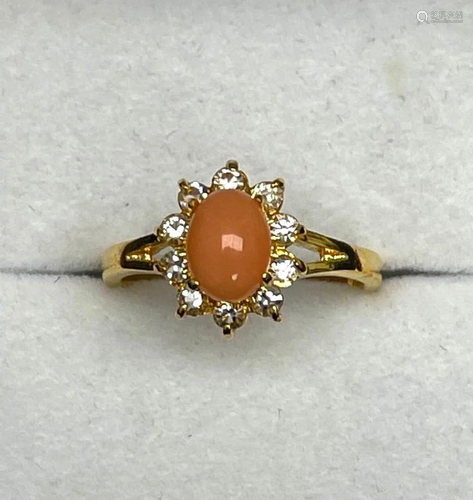 Gorgeous Coral Gemstone Ring in a Halo Setting Surrounded by...