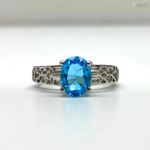 Large Blue Topaz Gemstone on an Intricate 925 Sterling Silve...