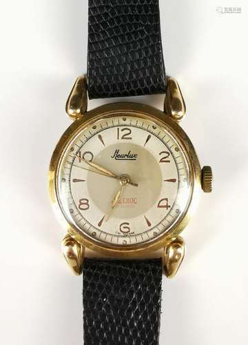 HEURLUX.Montre bracelet d'homme, le boitier et le cadran...