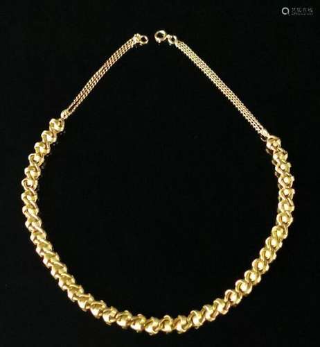 Collier en or jaune, à maillons entrelacés striés.L_ 45.5 cm...