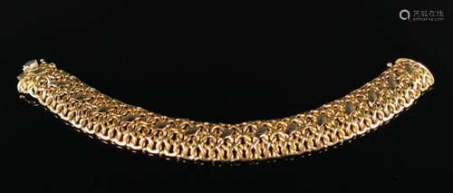 Bracelet souple en or deux tons, ajouré. L_22 cm.28,76 gramm...