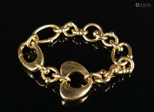 Bracelet à breloques en or jaune.Italie.L_ 19 cm.27.05 gramm...