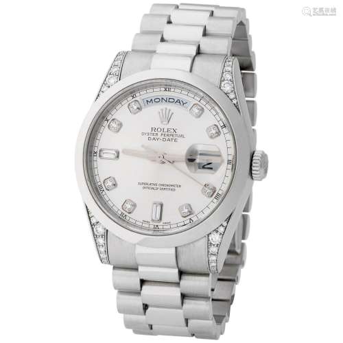 ROLEX. PRECIOUS AND ICONIC, DAY-DATE, WRISTWATCH IN PLATINUM...