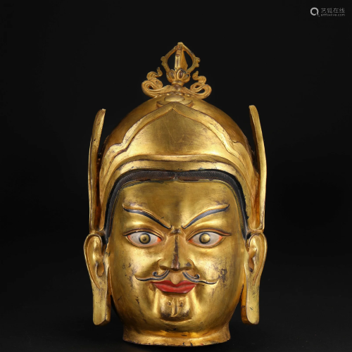 A Tibetan Bronze-gilt Padmasambhava Head