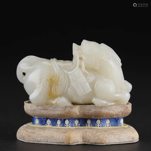 A Chinese Carved White Jade Beast