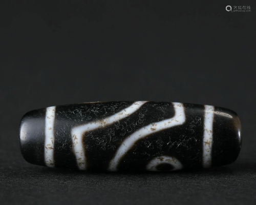 A Tibetan Dzi Bead