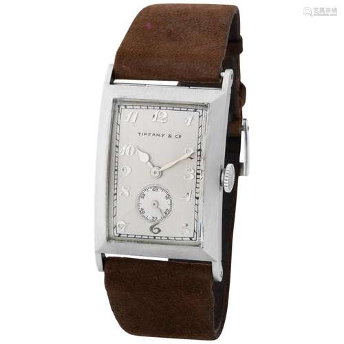 PATEK PHILIPPE. WELL PRESERVED AND ELEGANT, RECTANGULAR-SHAP...