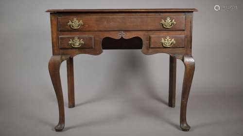 A 19th Century Oak Lowboy with Long Drawer over Two Small Dr...