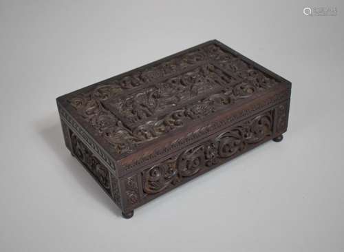 A 19th century Carved Indian Jewel Box, The Top Decorated wi...