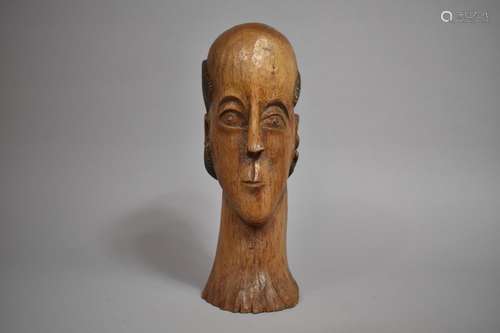 A Spanish Colonial Carved Hardwood Santos Head, 29cms High