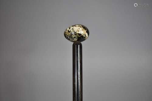 A 19th Century Walking Cane with a Cornish Serpentine Handle...