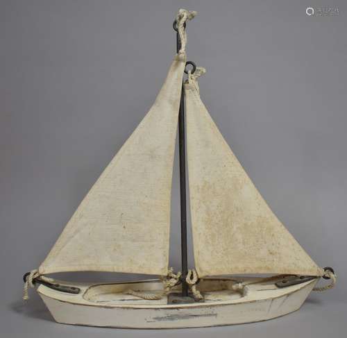 A Mid 20th Century Folk Art Pond Yacht with Canvas Sails and...