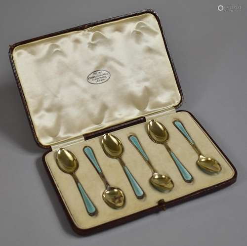 A Leather Cased Set of Six Gilt Silver and Blue Enamelled Te...