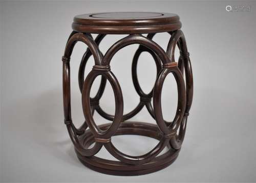 A Chinese Hardwood Drum Shaped Vase Stand, 16cms Diameter an...