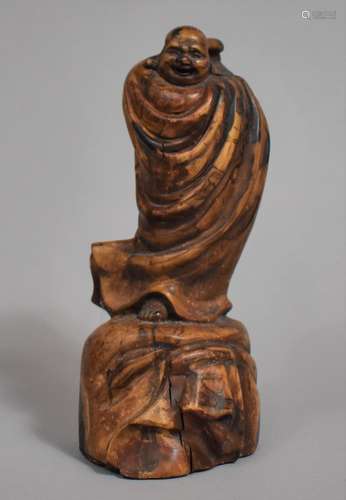 An Oriental Carved Wooden Study of Robed Immortal Standing o...