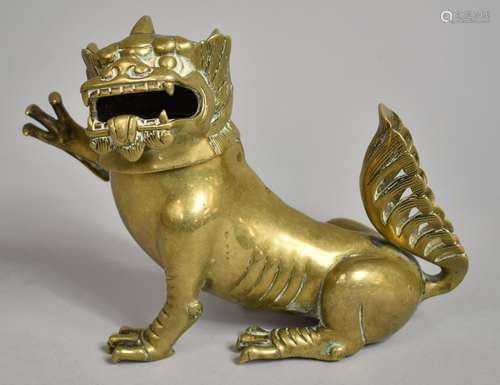 A Chinese Bronze Incense Burner in the Form of a Snarling Te...