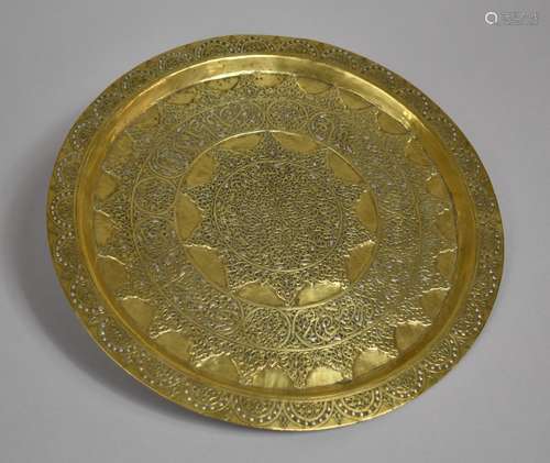 An Islamic Brass Charger Plate with Silver Overlay Decorated...