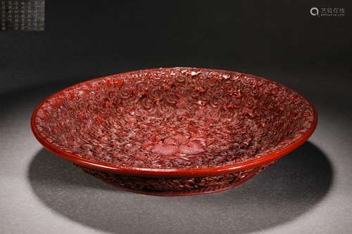 Carved red longevity plate from the Qing Dynasty